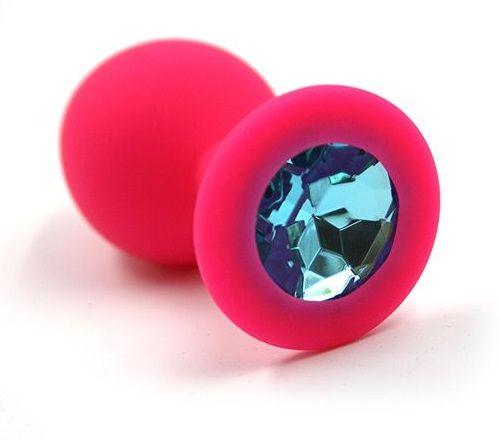 Розовая силиконовая анальная пробка с голубым кристаллом - 7 см.