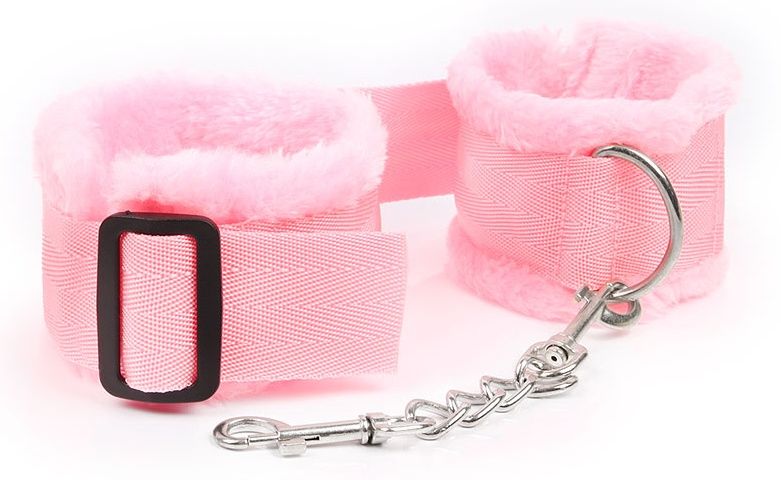 Розовые меховые наручники на регулируемых черных пряжках