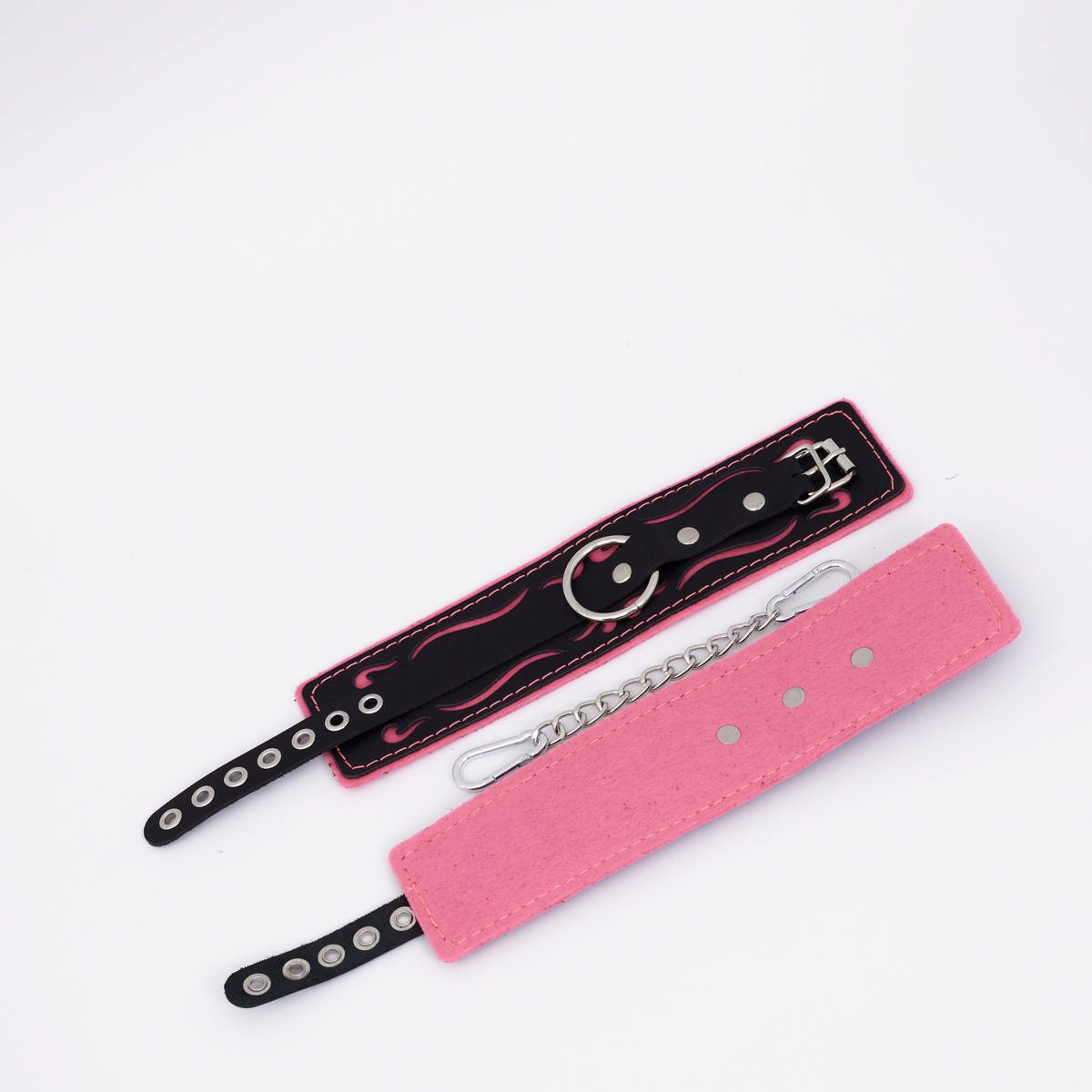 524967 Черно-розовые кожаные оковы с розовой строчкой
